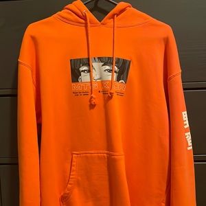 Orange. Size Medium Sweatshirt with Anime Design.